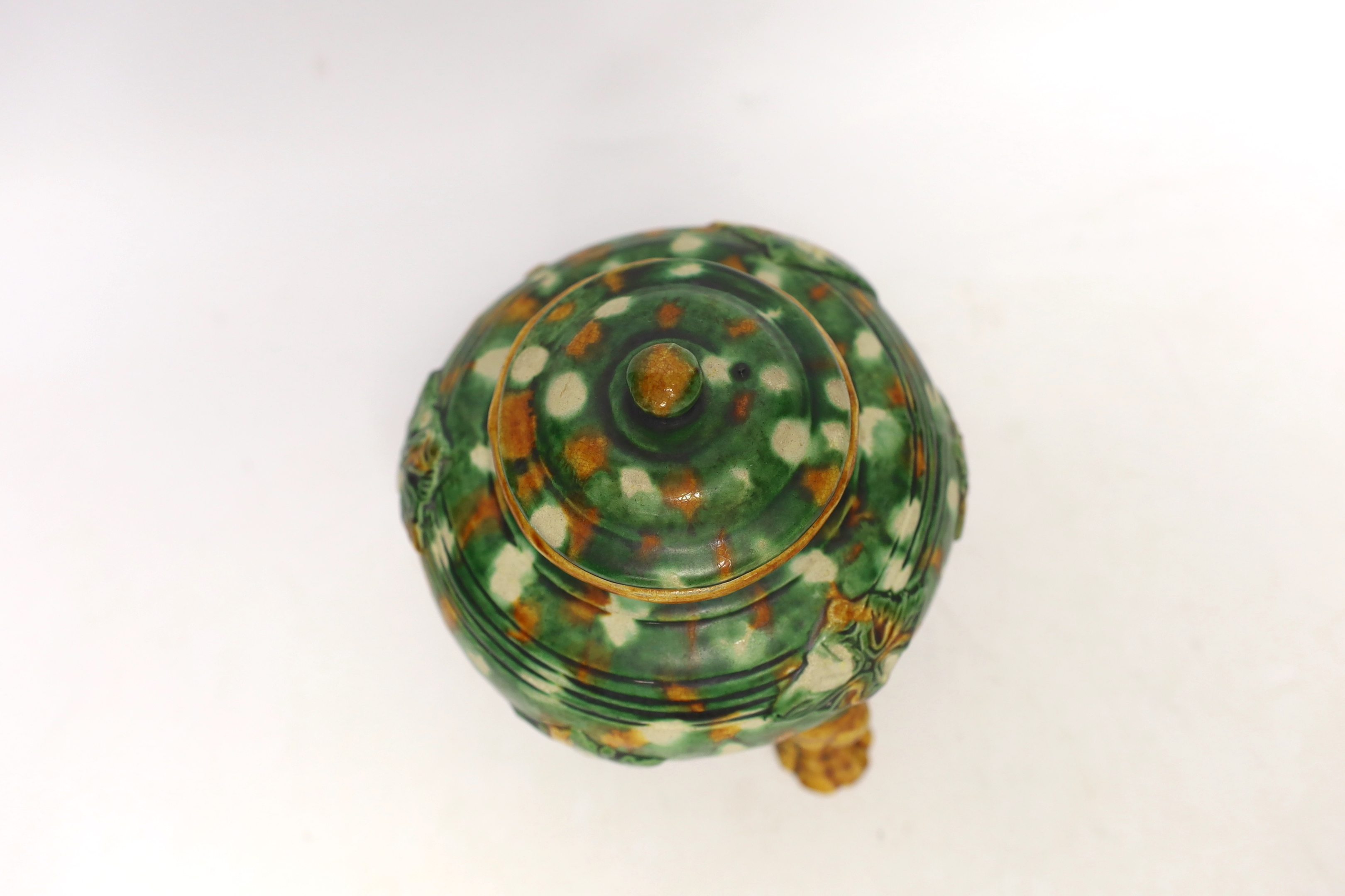 A Sancai three legged lidded pot, 13cm